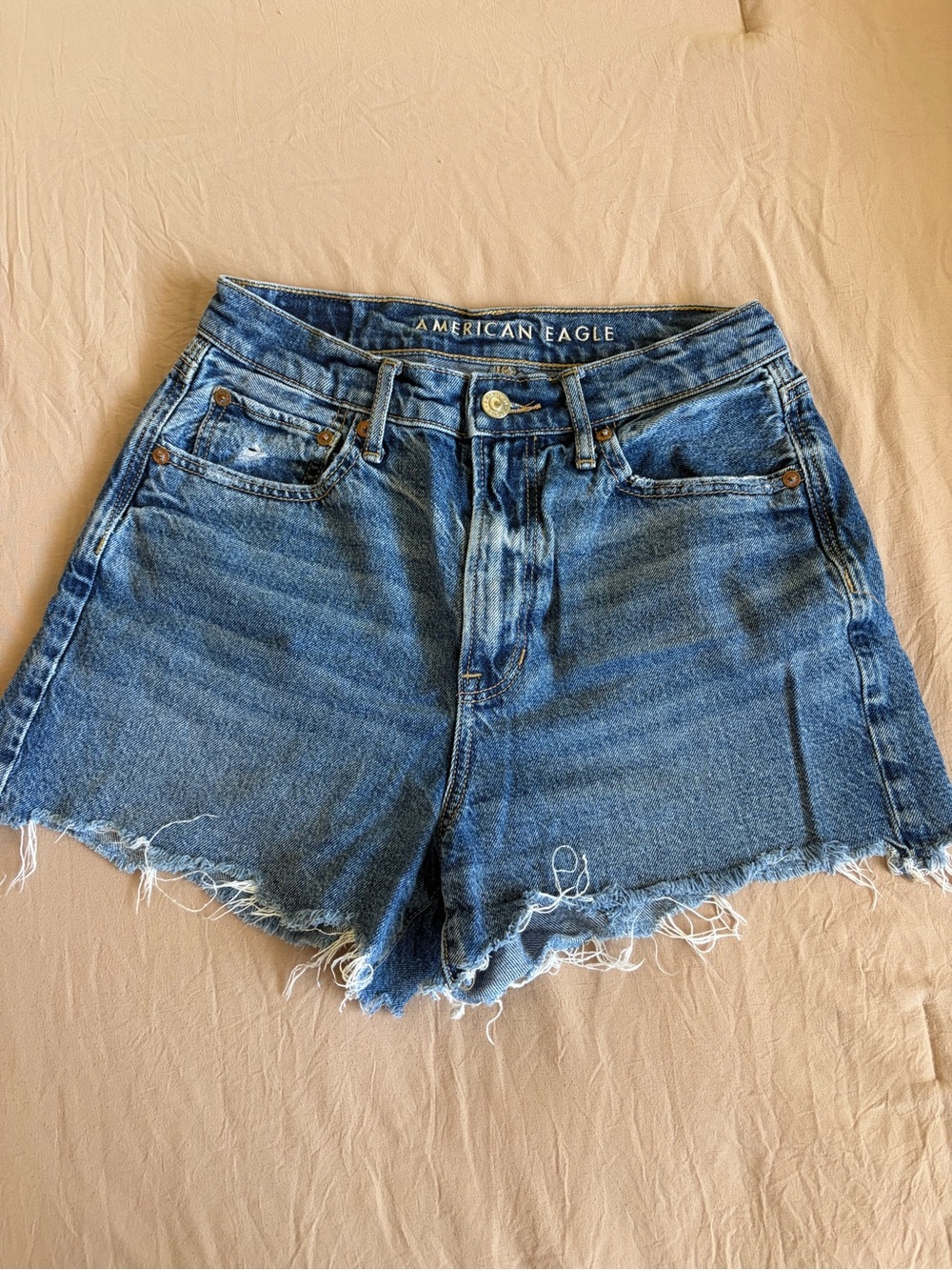 American Eagle Outfitters Raw-Hem Mid-Blue Denim Shorts